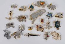 TWENTY-TWO FASHION BROOCHES