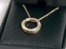 GOLD AND DIAMOND PENDANT