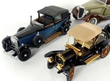 FOUR DIE-CAST CAR MODELS