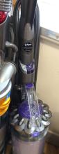 TWO DYSON UPRIGHT VACUUMS