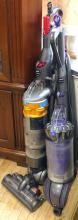 TWO DYSON UPRIGHT VACUUMS