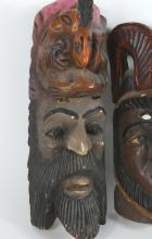 PAIR OF MEXICAN OR CENTRAL AMERICAN MASKS