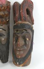 PAIR OF MEXICAN OR CENTRAL AMERICAN MASKS
