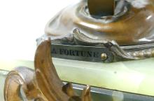 ONYX AND ORMOLU CLOCK WITH SPELTER SCULPTURE