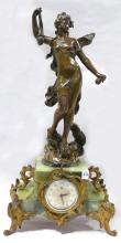 ONYX AND ORMOLU CLOCK WITH SPELTER SCULPTURE
