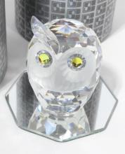 FOUR SWAROVSKI CRYSTAL FIGURINES
