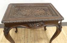 CARVED MAHOGANY TABLE