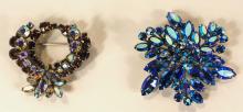 TWO SHERMAN BROOCHES