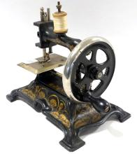 ANTIQUE TOY SEWING MACHINE