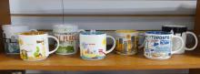 SEVEN "STARBUCKS" COFFEE MUGS