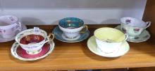 SEVEN CUPS AND SAUCERS