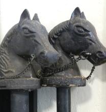 TWO CAST IRON HITCHING POSTS