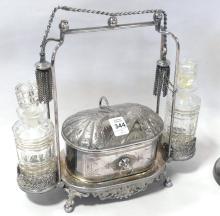 SILVER PLATE SERVING STAND AND CELERY CRUET