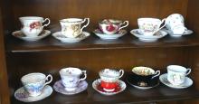 TEN CUPS AND SAUCERS