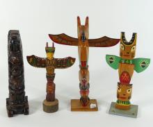 CARVED TOTEM POLES