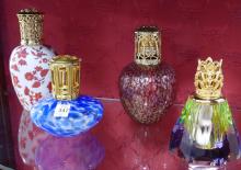 FIVE OIL LAMPS AND LIGHT
