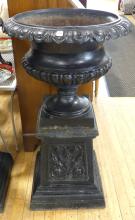 PAIR OF ANTIQUE CAST IRON GARDEN URNS