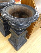 PAIR OF ANTIQUE CAST IRON GARDEN URNS