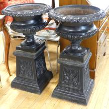 PAIR OF ANTIQUE CAST IRON GARDEN URNS