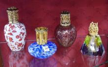 FIVE OIL LAMPS AND LIGHT