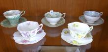 FIVE ENGLISH CUPS AND SAUCERS