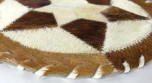 PAIR COWHIDE TRIVETS