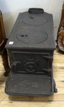 ANTIQUE ACME CAST IRON STOVE