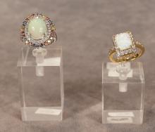 TWO STERLING OPAL RINGS