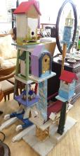 TWO WOODEN BIRDHOUSE STANDS