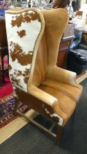 COWHIDE WING-BACK ARMCHAIR