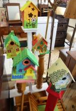 TWO WOODEN BIRDHOUSE STANDS