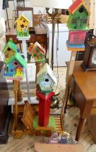 TWO WOODEN BIRDHOUSE STANDS