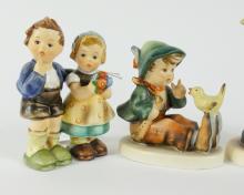 4 HUMMEL FIGURINES