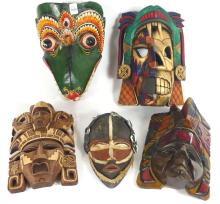 FIVE CARVED MASKS