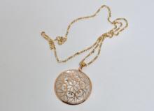 14 KARAT GOLD MOTHER-OF-PEARL PENDANT