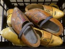 CRATE OF WOODEN CLOGS
