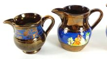 4 ANTIQUE COPPER LUSTRE PITCHERS