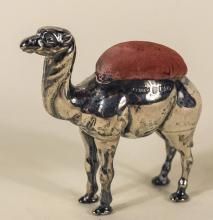 EDWARDIAN SILVER CAMEL PINCUSHION