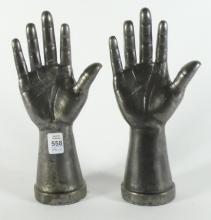 PAIR OF CAST IRON "HAND" SCULPTURES