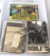 TWO ALBUMS OF POSTCARDS