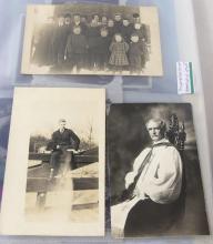 TWO ALBUMS OF POSTCARDS