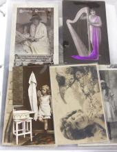 TWO ALBUMS OF POSTCARDS