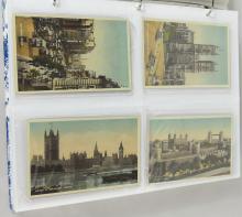 TWO ALBUMS OF POSTCARDS