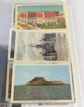 TWO ALBUMS OF POSTCARDS