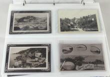 TWO ALBUMS OF POSTCARDS