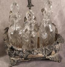TWO CRUET SETS AND DECANTER