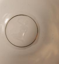 FOUR CUPS AND SAUCERS