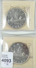 2 GRADED CANADIAN SILVER DOLLARS