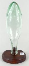 ANTIQUE BOTTLE ON STAND