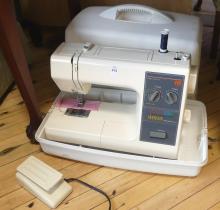 PORTABLE KENMORE SEWING MACHINE